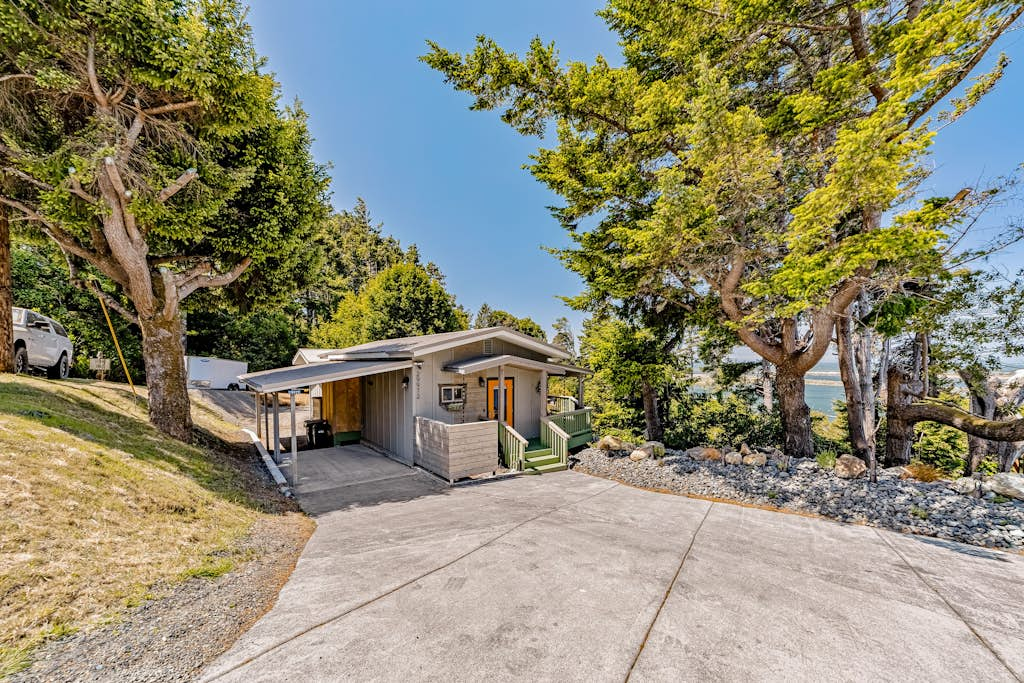 Charming coastal home with water views, large covered deck