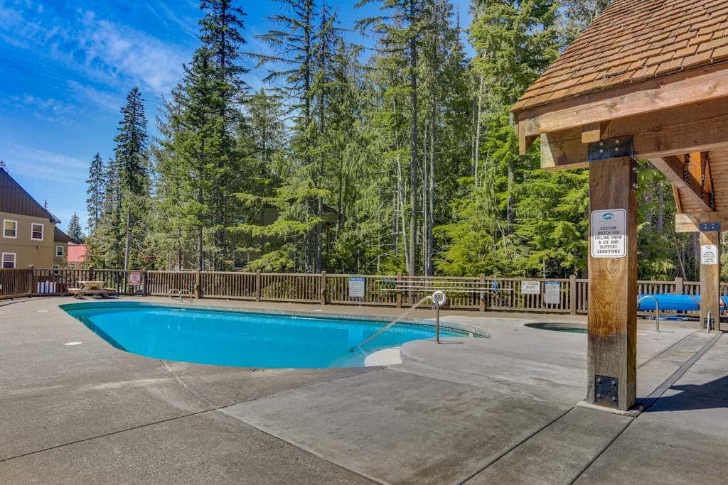 Dog-friendly, upscale condo with shared pool & hot tub - one mile from skiing