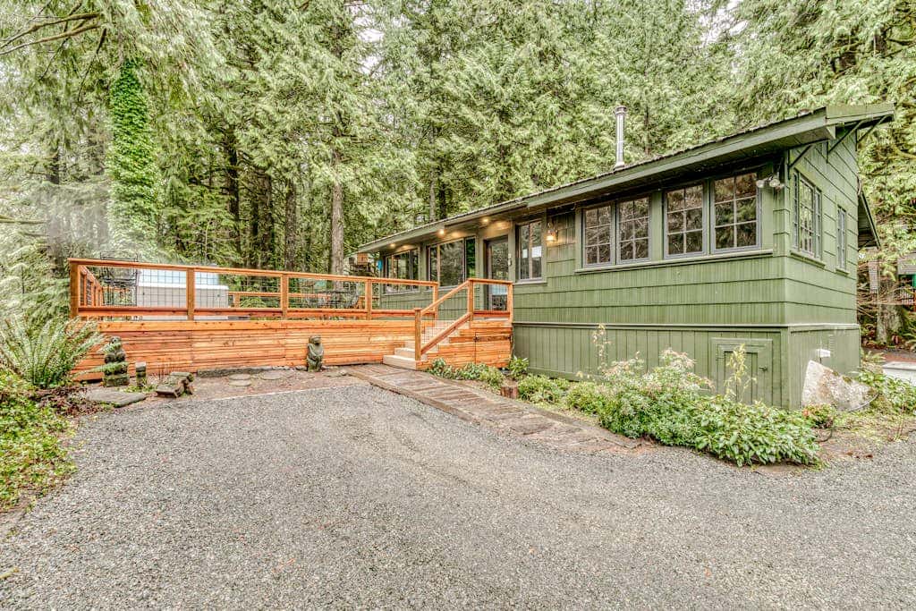 Classic forest cabin on Still Creek with private hot tub & wood fireplace