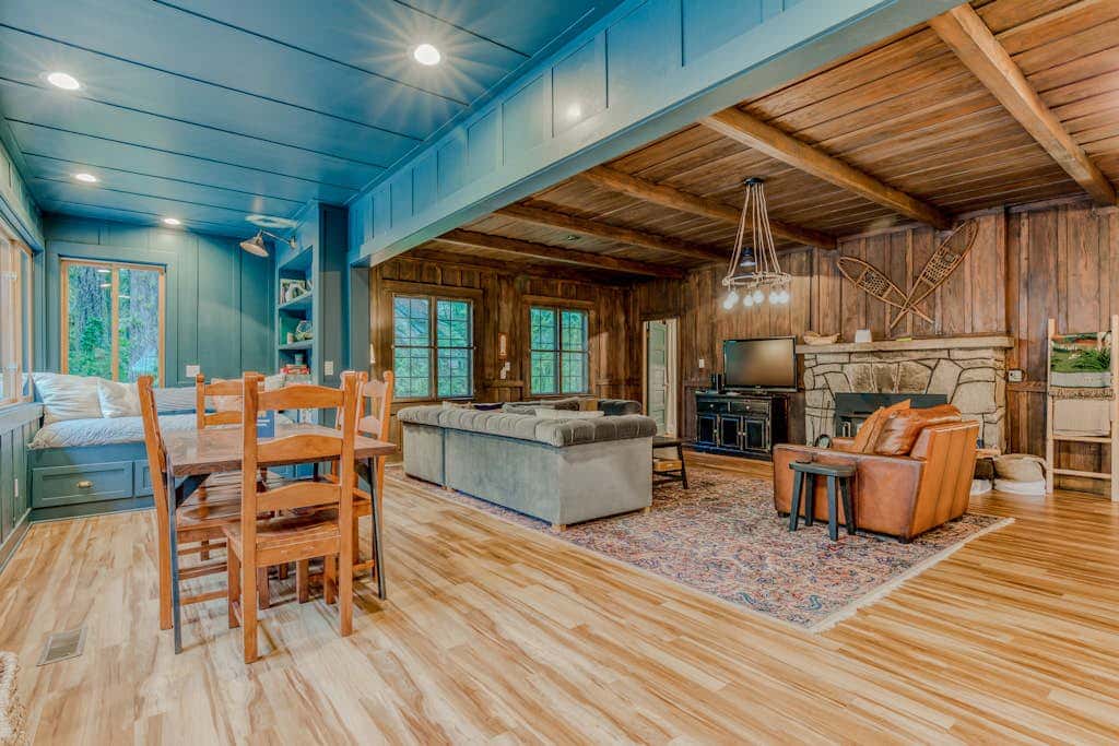 Classic forest cabin on Still Creek with private hot tub & wood fireplace