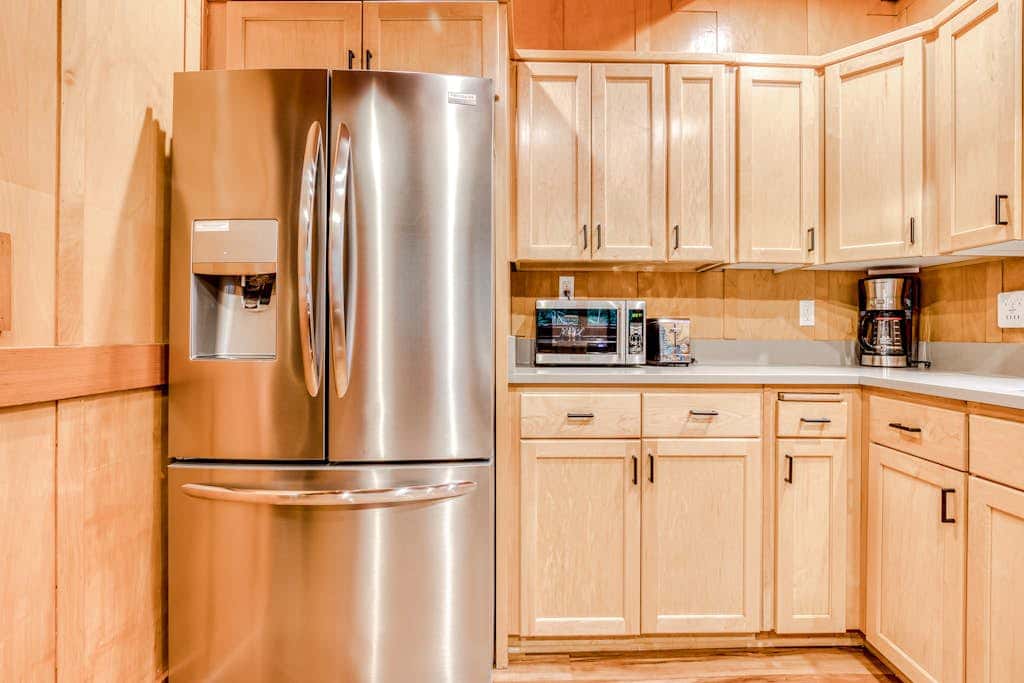 Classic forest cabin on Still Creek with private hot tub & wood fireplace