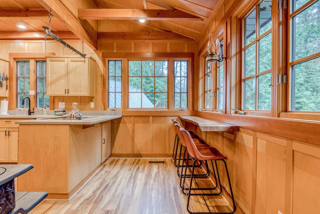 Classic forest cabin on Still Creek with private hot tub & wood fireplace
