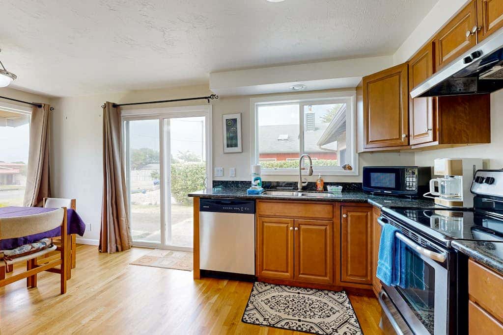 Experience Comfort and Serenity by the Sea, Dog Friendly with AC, & Patio