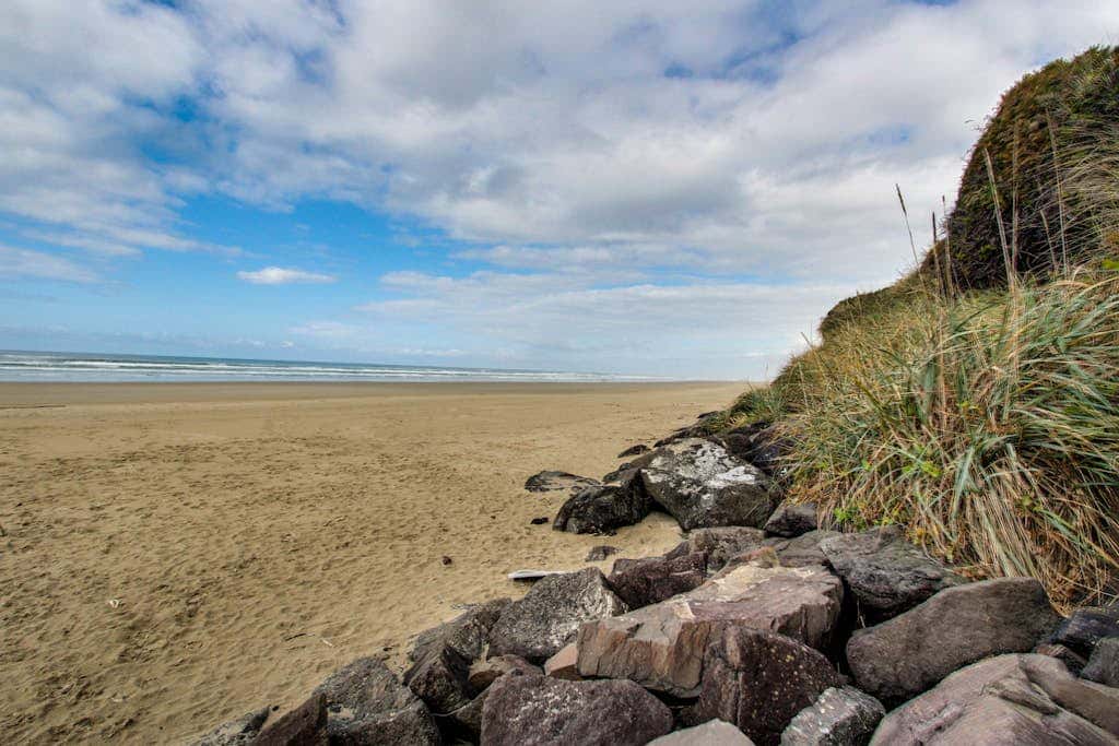 Experience Comfort and Serenity by the Sea, Dog Friendly with AC, & Patio
