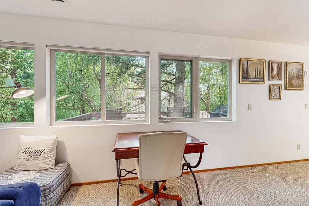 Forest-view home with fireplace, deck - Walk to the Beach & Golf Course