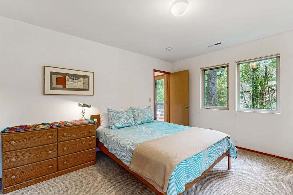 Forest-view home with fireplace, deck - Walk to the Beach & Golf Course