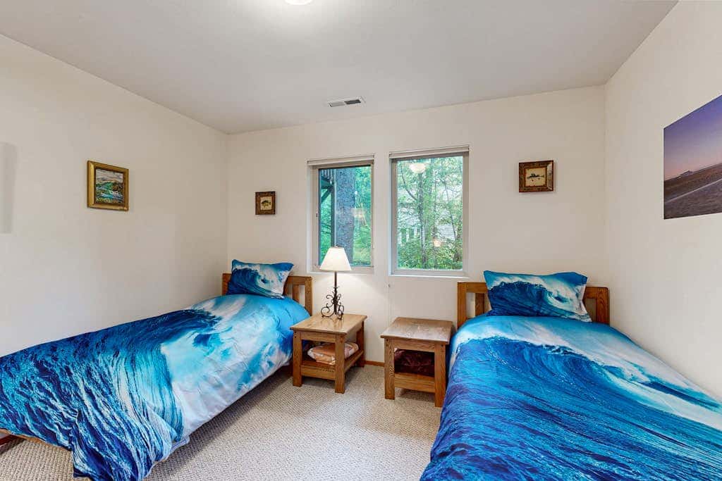 Forest-view home with fireplace, deck - Walk to the Beach & Golf Course