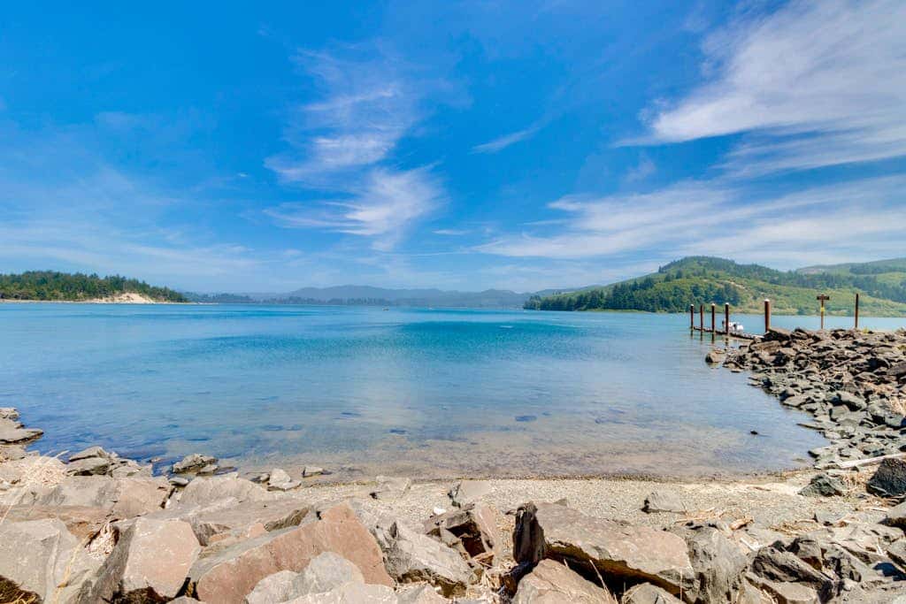 Forest-view home with fireplace, deck - Walk to the Beach & Golf Course