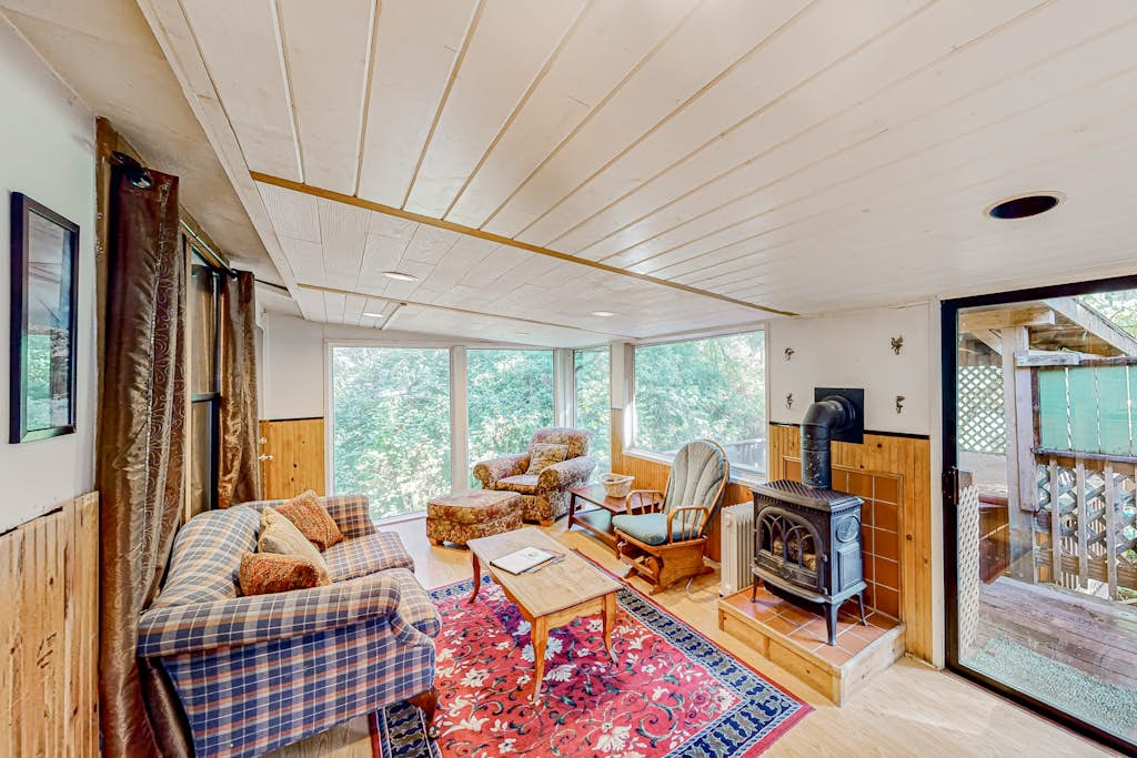 Delightful coastal escape with private hot tub, generous patio, & nature views