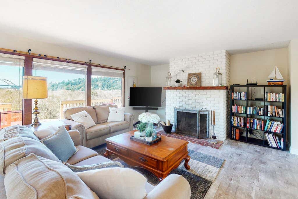 Dog-friendly house on Alsea Bay with bridge views, grill & private hot tub