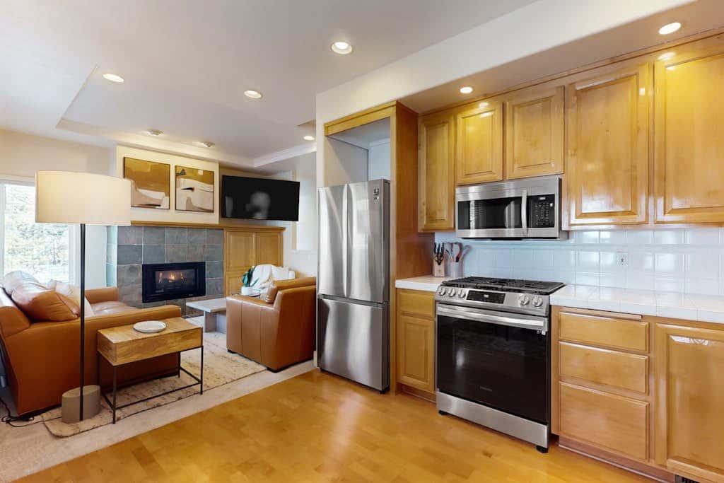Conveniently located townhome with kitchen, kitchenette, balcony & fireplace