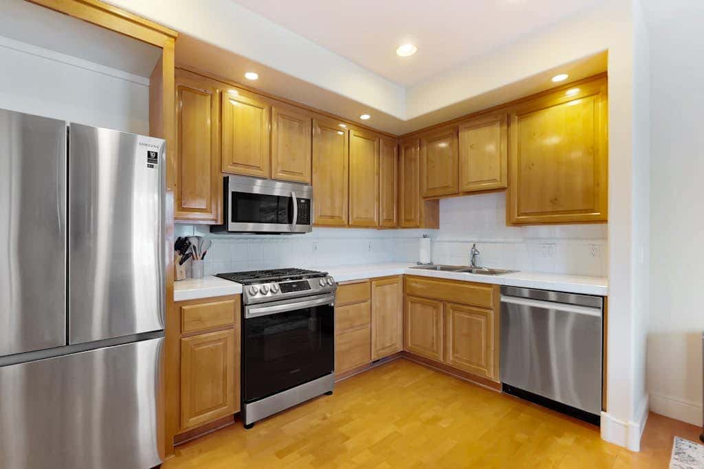 Conveniently located townhome with kitchen, kitchenette, balcony & fireplace