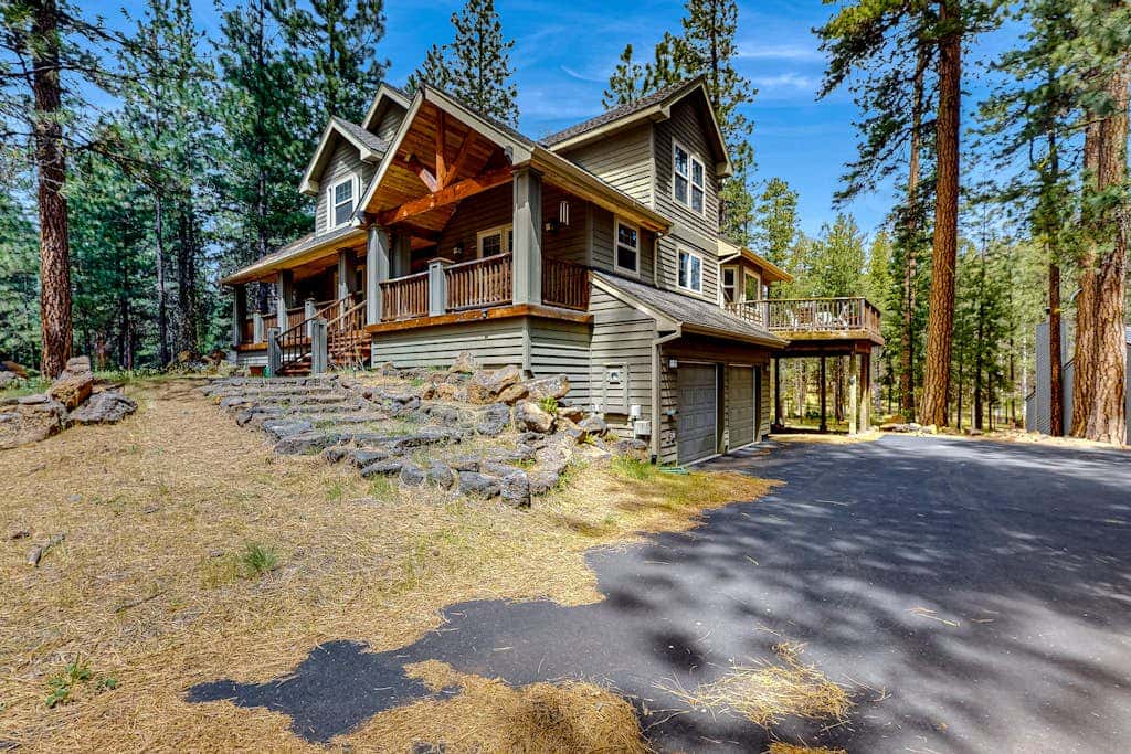 Spacious family home with wraparound deck, gas grill, and resort amenities
