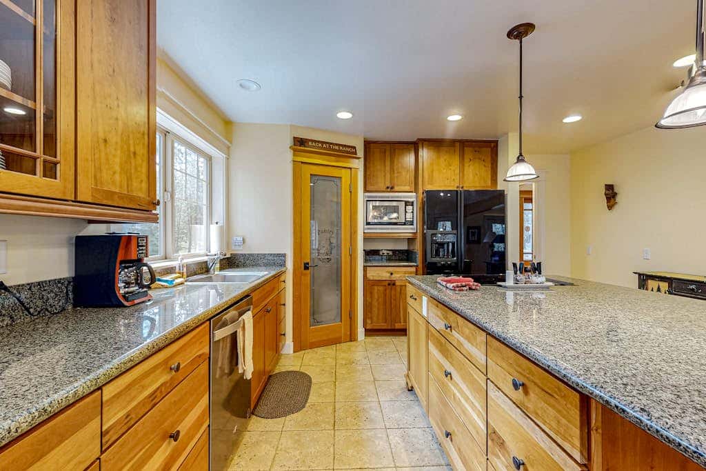 Spacious family home with wraparound deck, gas grill, and resort amenities
