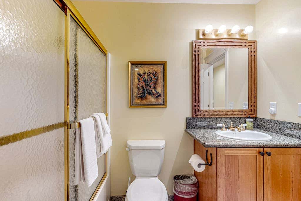 Spacious family home with wraparound deck, gas grill, and resort amenities