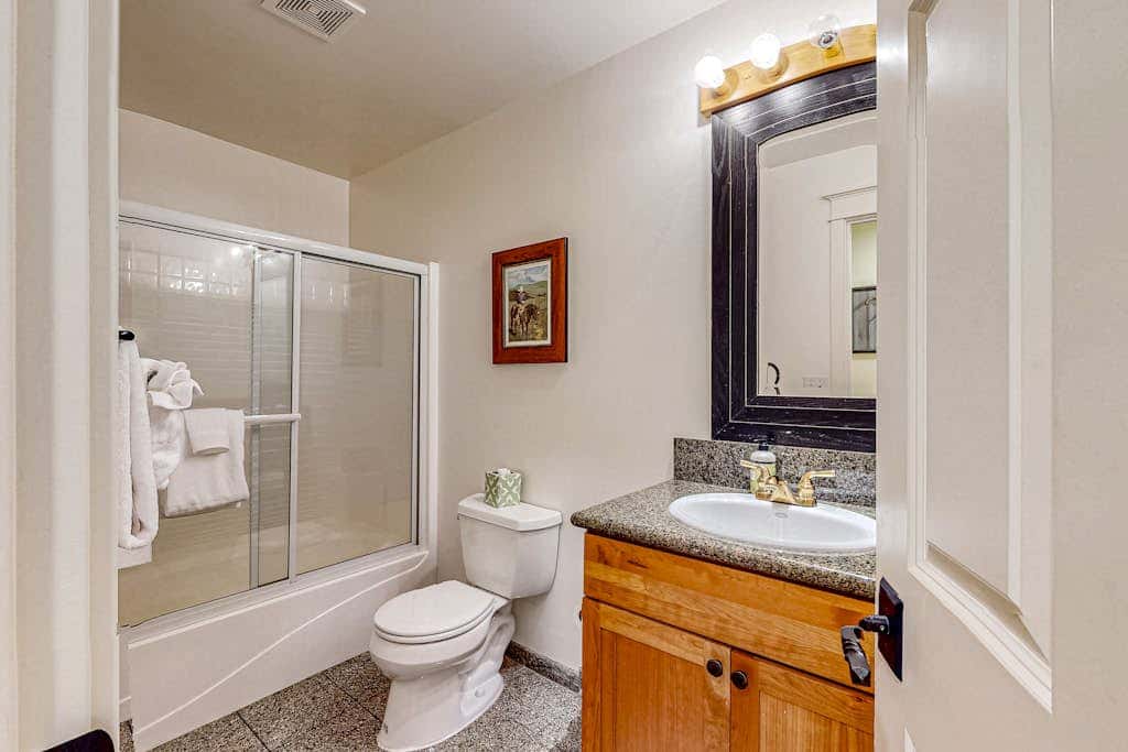 Spacious family home with wraparound deck, gas grill, and resort amenities