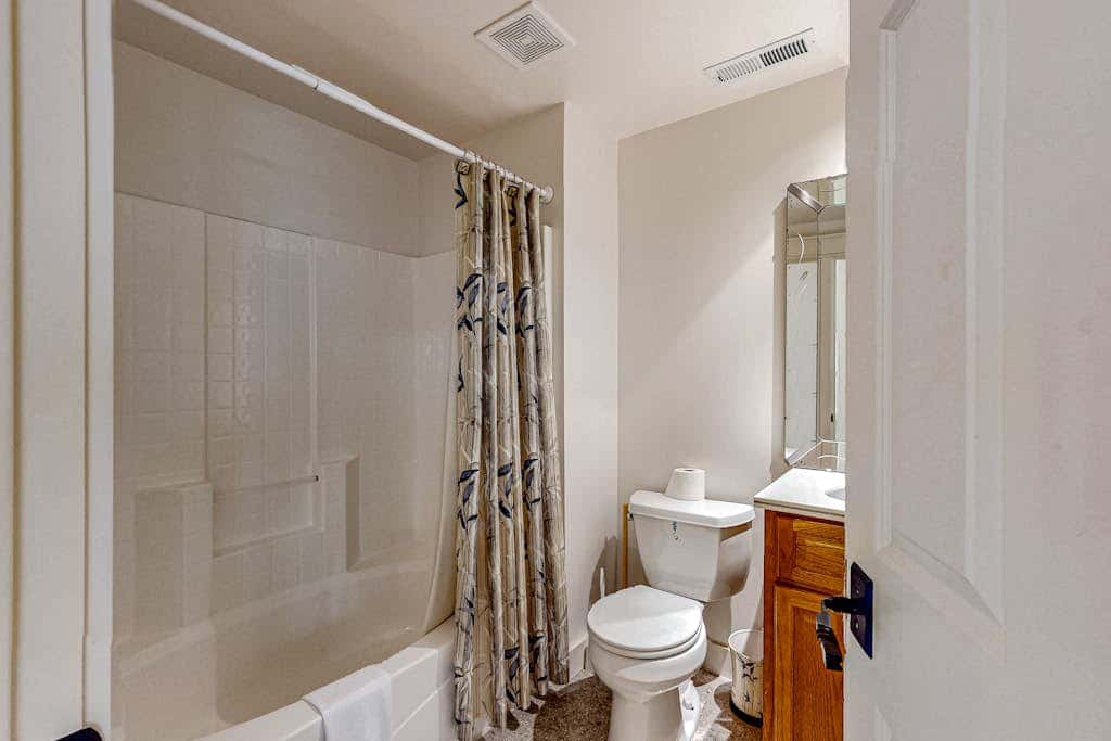 Spacious family home with wraparound deck, gas grill, and resort amenities