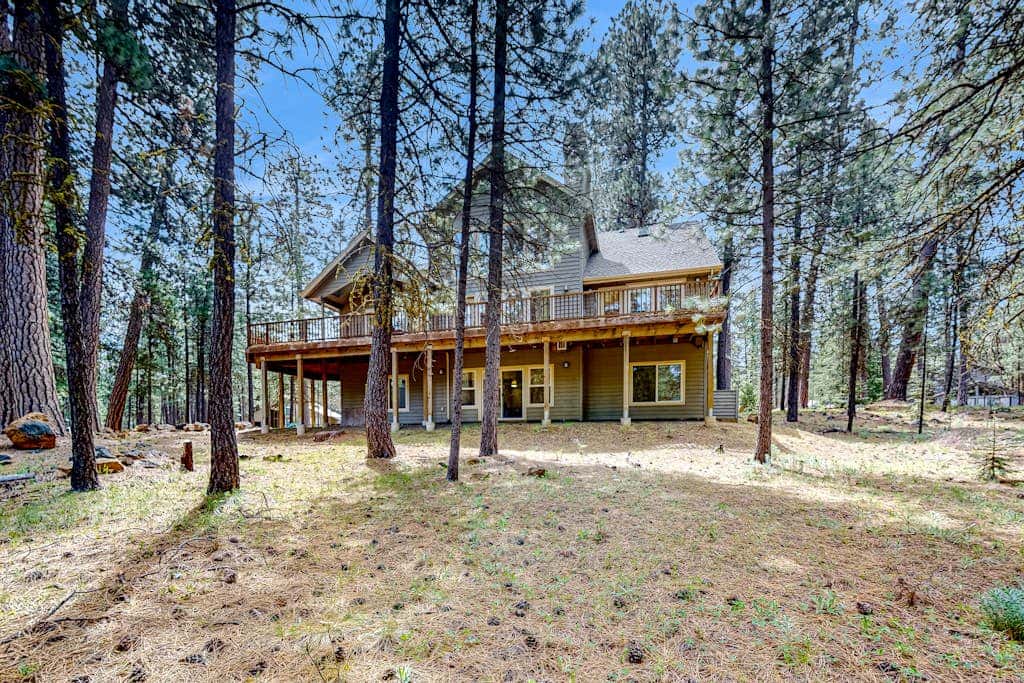 Spacious family home with wraparound deck, gas grill, and resort amenities