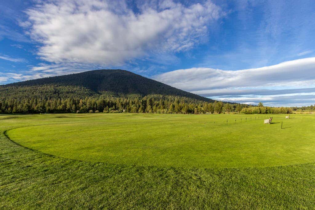Spacious family home with wraparound deck, gas grill, and resort amenities