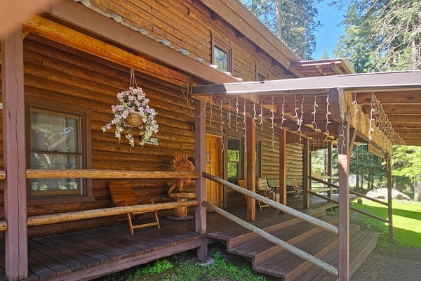 Bring the family to Wallowa Lake and settle into a spacious mountain log home built for gathering, relaxing, and exploring. This Wallowa Lake home will be the perfect basecamp for you and your family. It puts you close to the lake, the tram, horseback riding, hiking, fishing, Joseph, and the Eagle Cap Wilderness with plenty of room to come back, cook dinner, sit by the wood stove, and enjoy time together. Outside, the home features a park-like front yard that gives families and groups room to relax, gather, and enjoy the mountain setting. The home includes a full kitchen, washer and dryer, internet access, gas grill, pellet smoker, comfortable gathering spaces, and the practical amenities families and groups need for a longer stay.