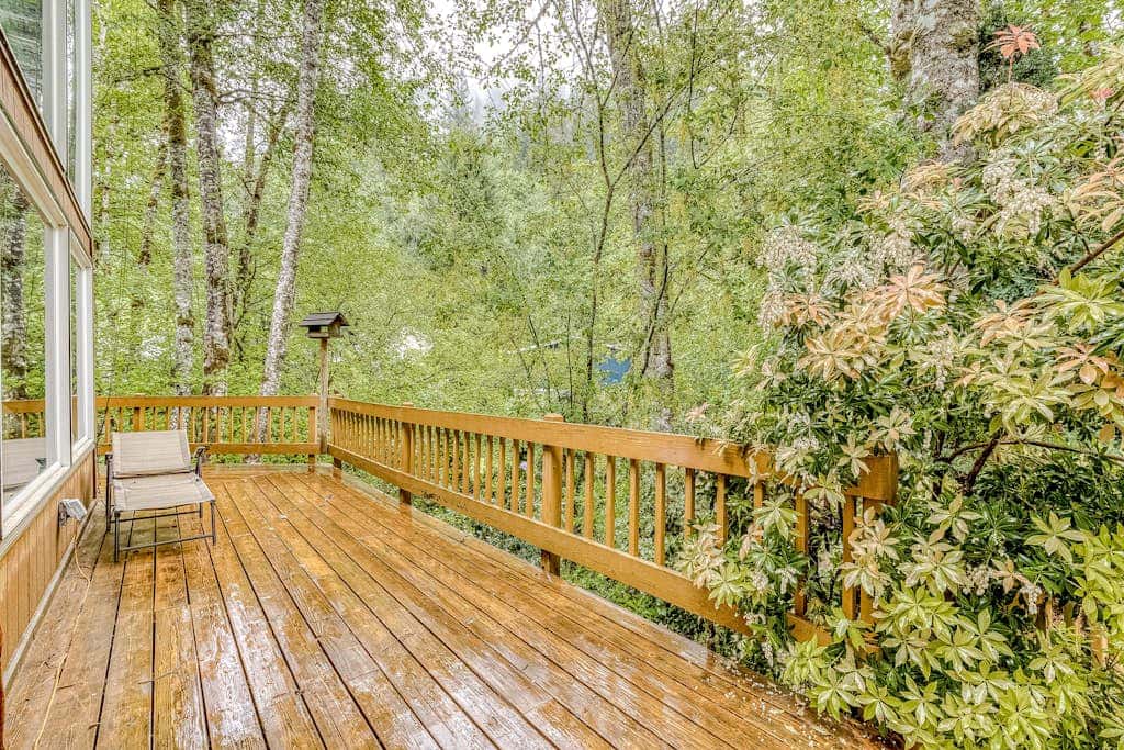 Expansive Wooded Home with a Brook, Firepit, Private Hot Tub and Shared Pool