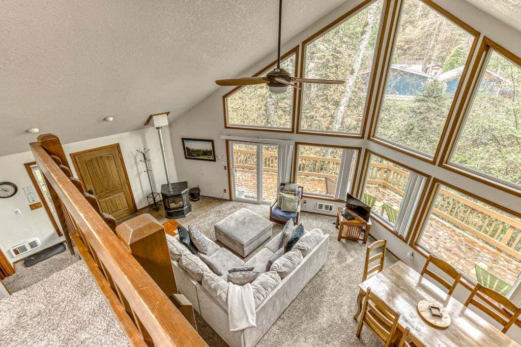Expansive Wooded Home with a Brook, Firepit, Private Hot Tub and Shared Pool