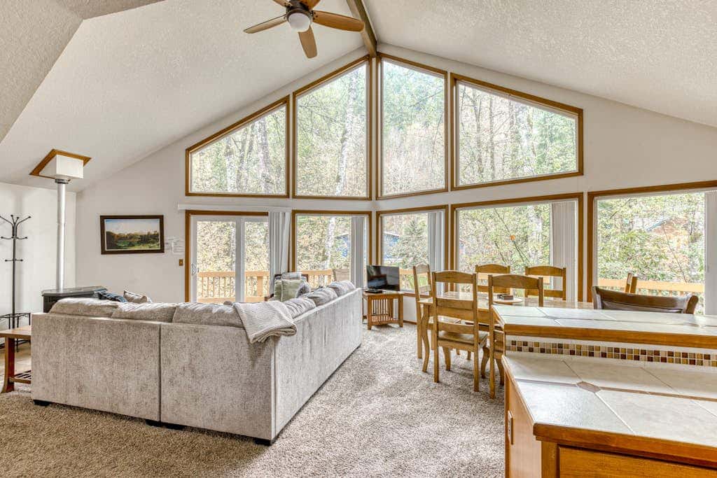 Expansive Wooded Home with a Brook, Firepit, Private Hot Tub and Shared Pool