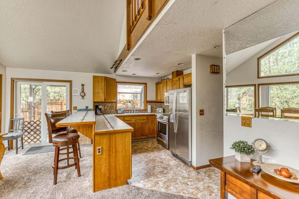 Expansive Wooded Home with a Brook, Firepit, Private Hot Tub and Shared Pool