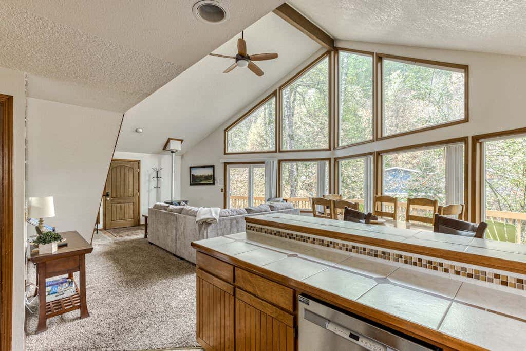 Expansive Wooded Home with a Brook, Firepit, Private Hot Tub and Shared Pool