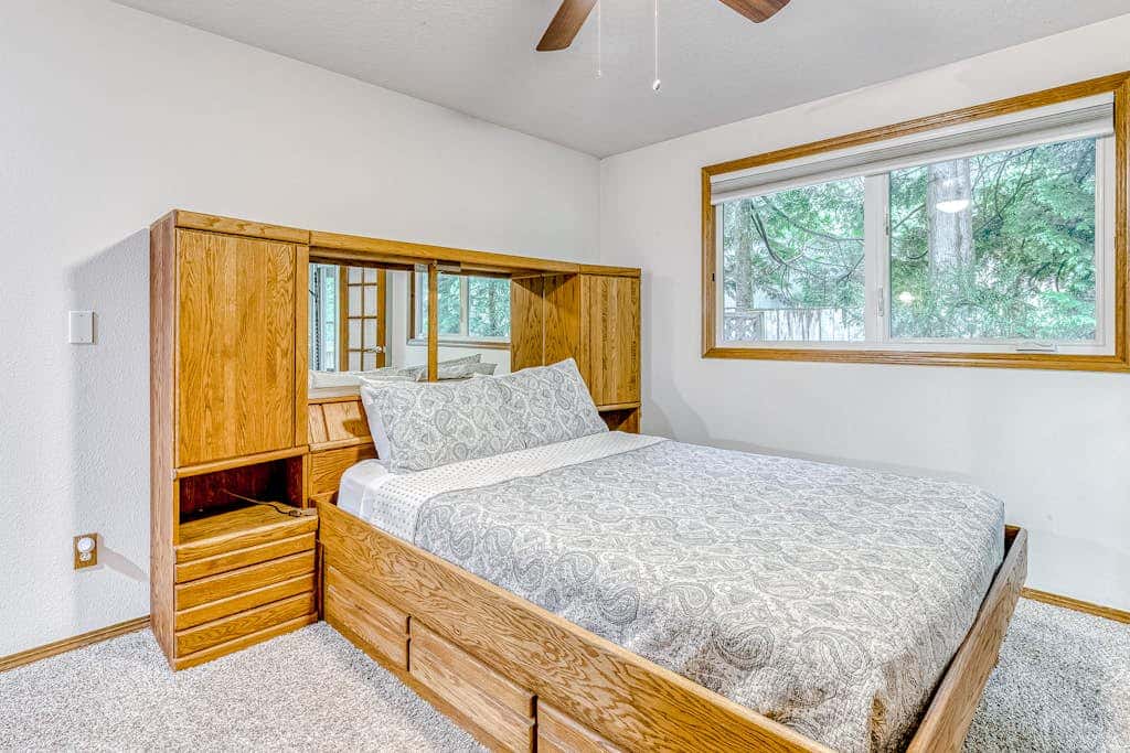 Expansive Wooded Home with a Brook, Firepit, Private Hot Tub and Shared Pool