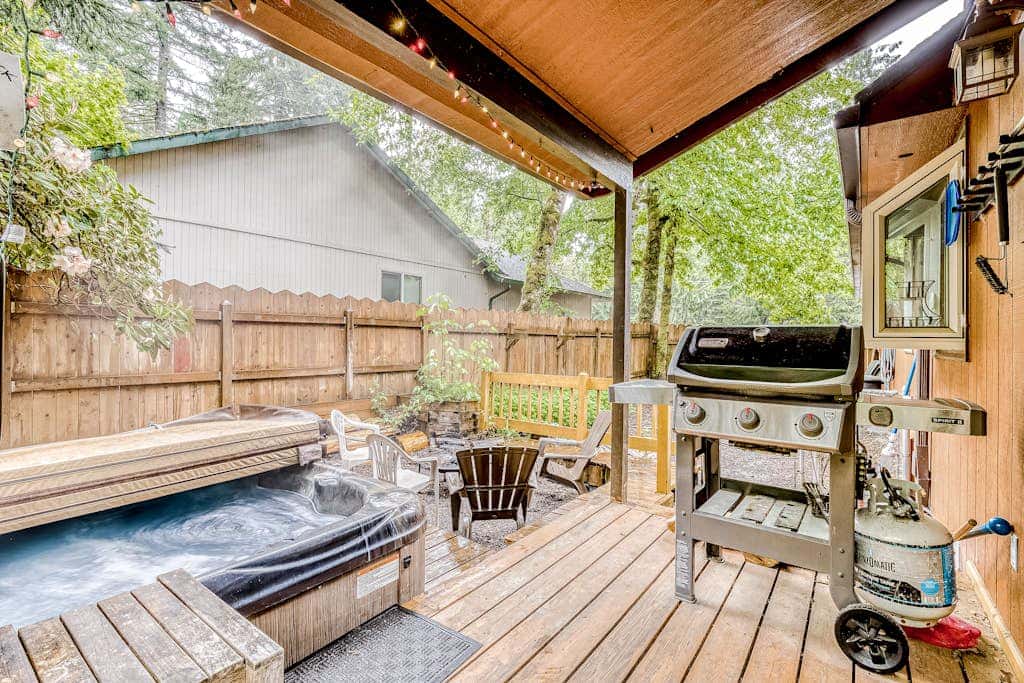 Expansive Wooded Home with a Brook, Firepit, Private Hot Tub and Shared Pool