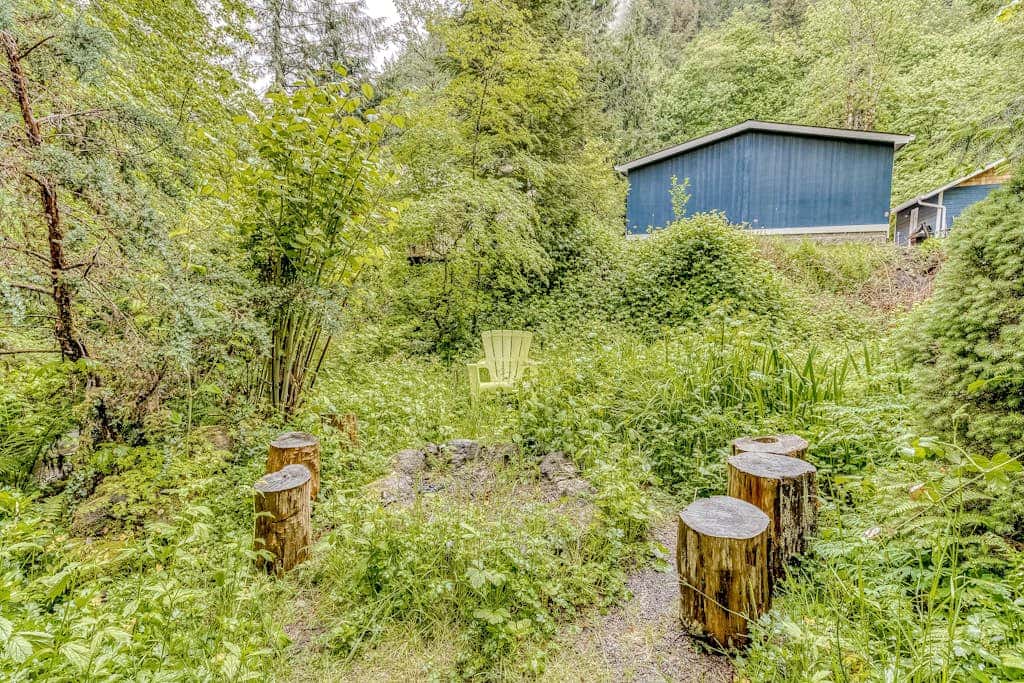 Expansive Wooded Home with a Brook, Firepit, Private Hot Tub and Shared Pool