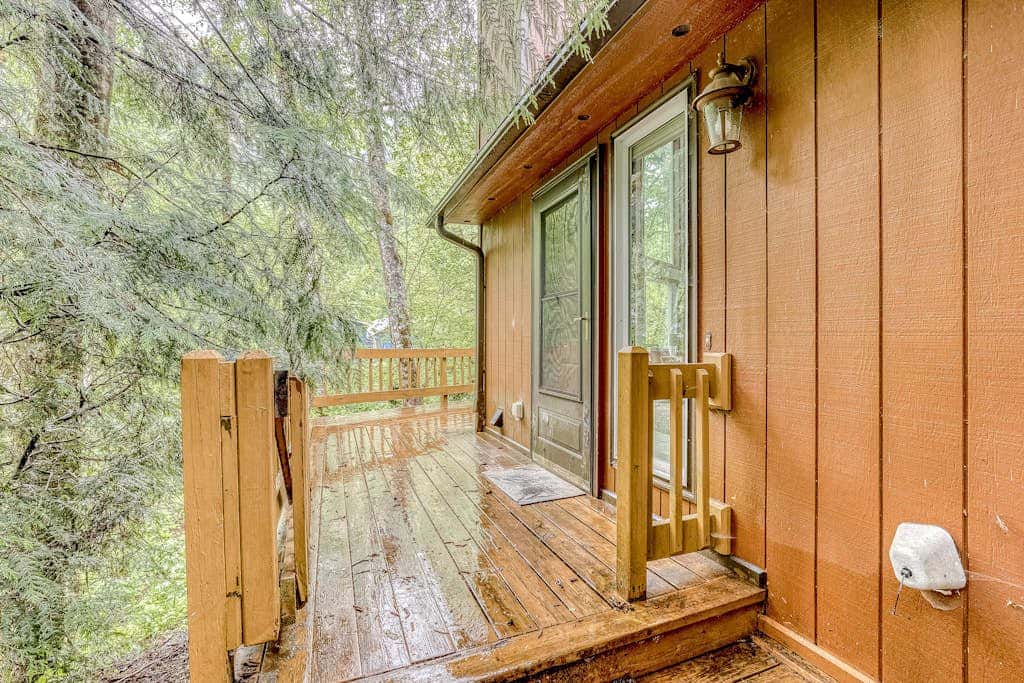 Expansive Wooded Home with a Brook, Firepit, Private Hot Tub and Shared Pool