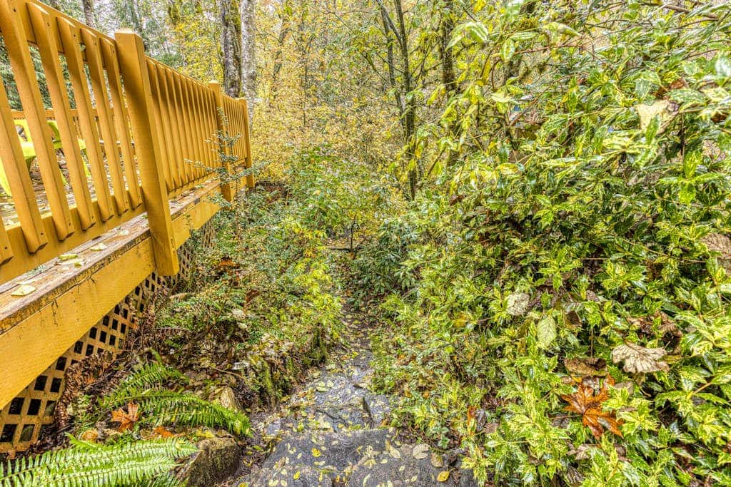 Expansive Wooded Home with a Brook, Firepit, Private Hot Tub and Shared Pool