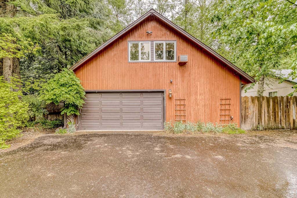 Expansive Wooded Home with a Brook, Firepit, Private Hot Tub and Shared Pool