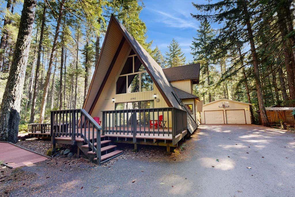 Dog-friendly, A-frame cabin with private hot tub - tranquil setting near skiing