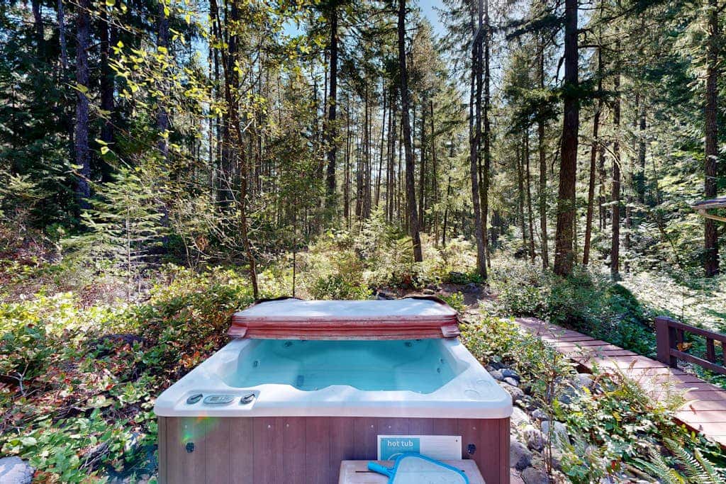 Dog-friendly, A-frame cabin with private hot tub - tranquil setting near skiing