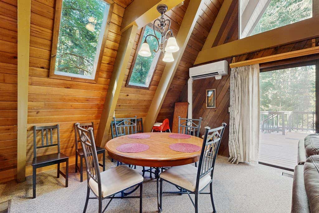 Dog-friendly, A-frame cabin with private hot tub - tranquil setting near skiing