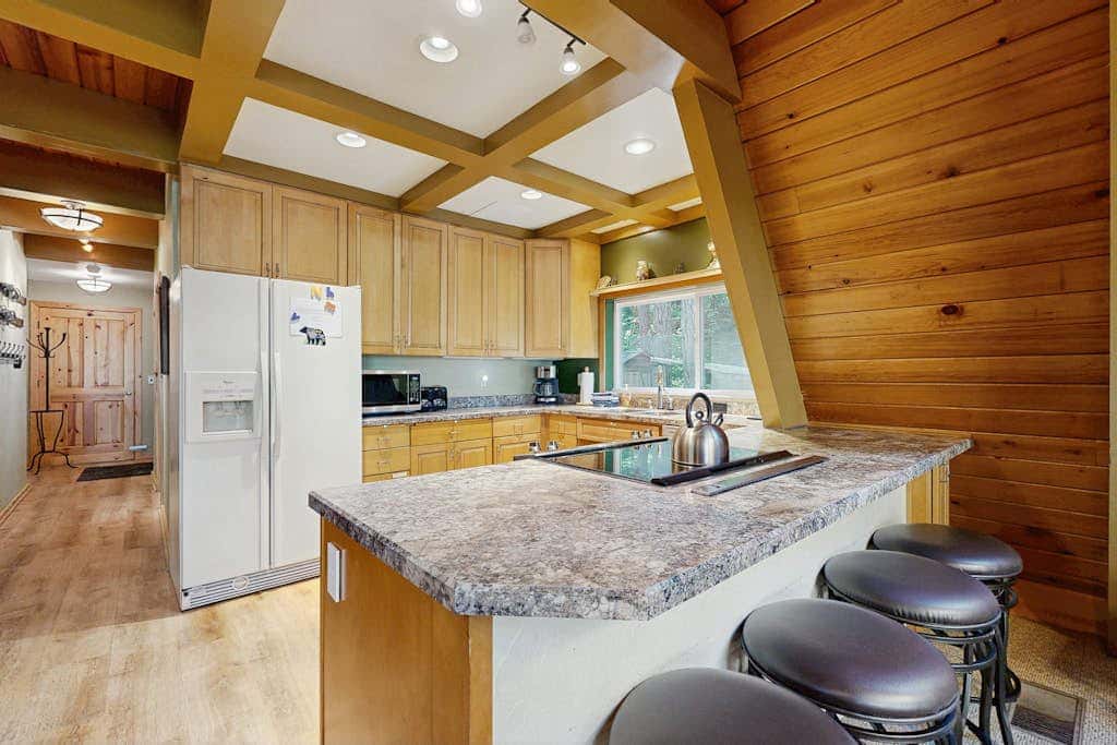 Dog-friendly, A-frame cabin with private hot tub - tranquil setting near skiing