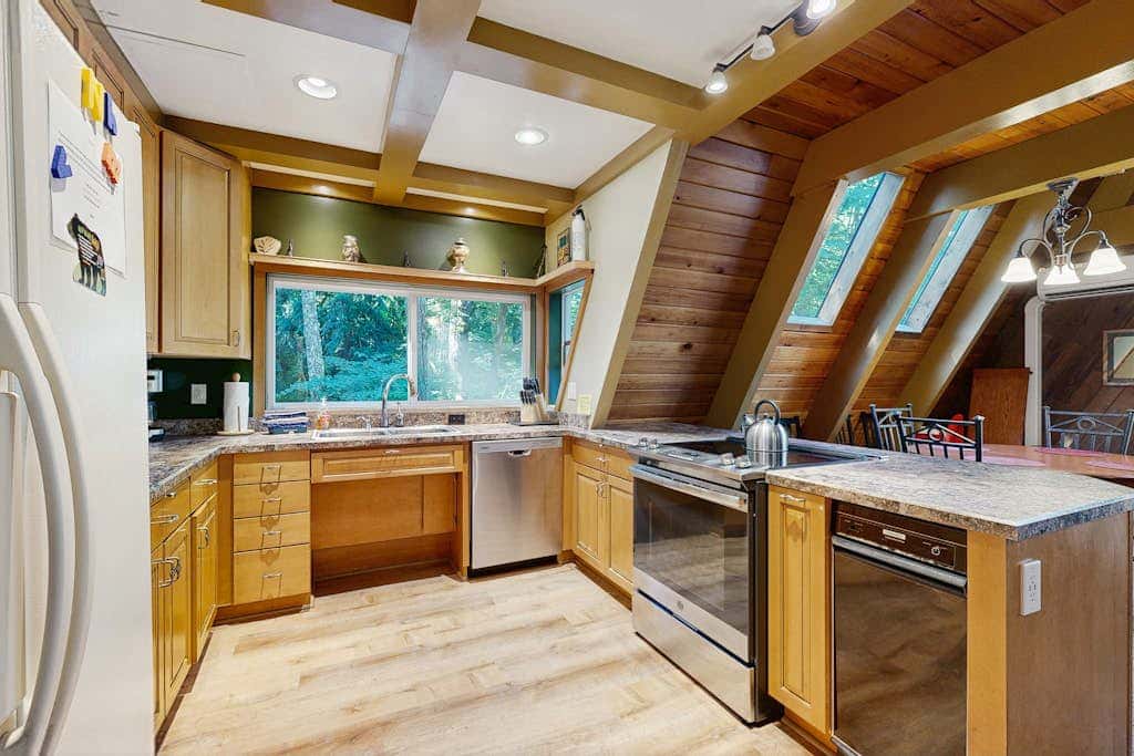Dog-friendly, A-frame cabin with private hot tub - tranquil setting near skiing