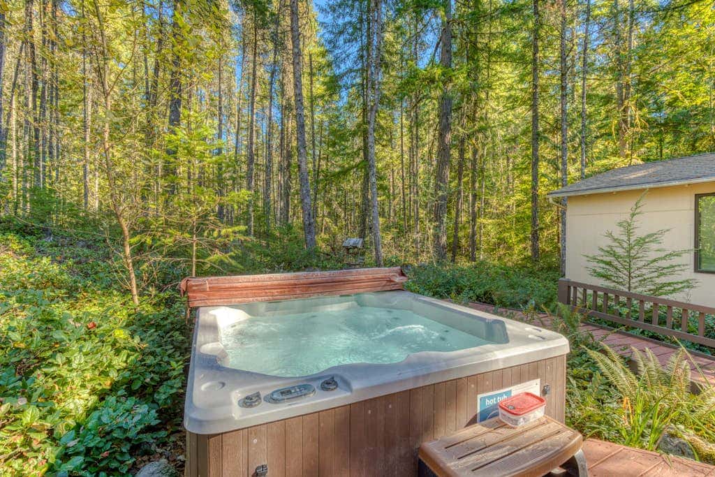 Dog-friendly, A-frame cabin with private hot tub - tranquil setting near skiing