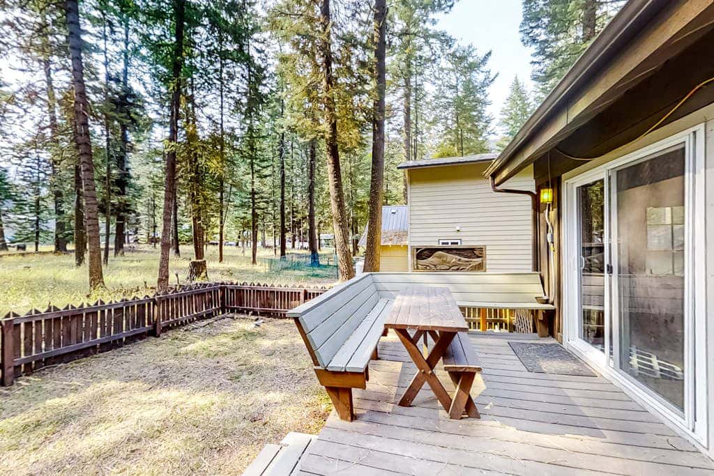 Woodland Cabin w/ Fenced Backyard, Deck, Front Porch & WiFi - Dogs Welcome