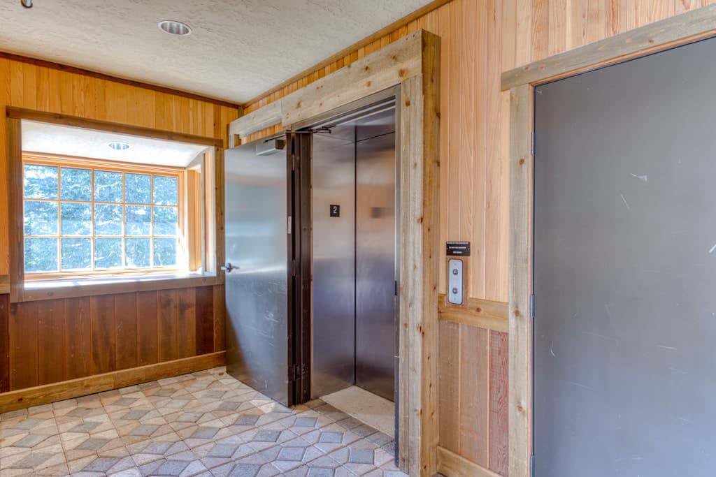 Luxury Govt Camp condo with fireplace, updated amenities, & shared pool & hot tub