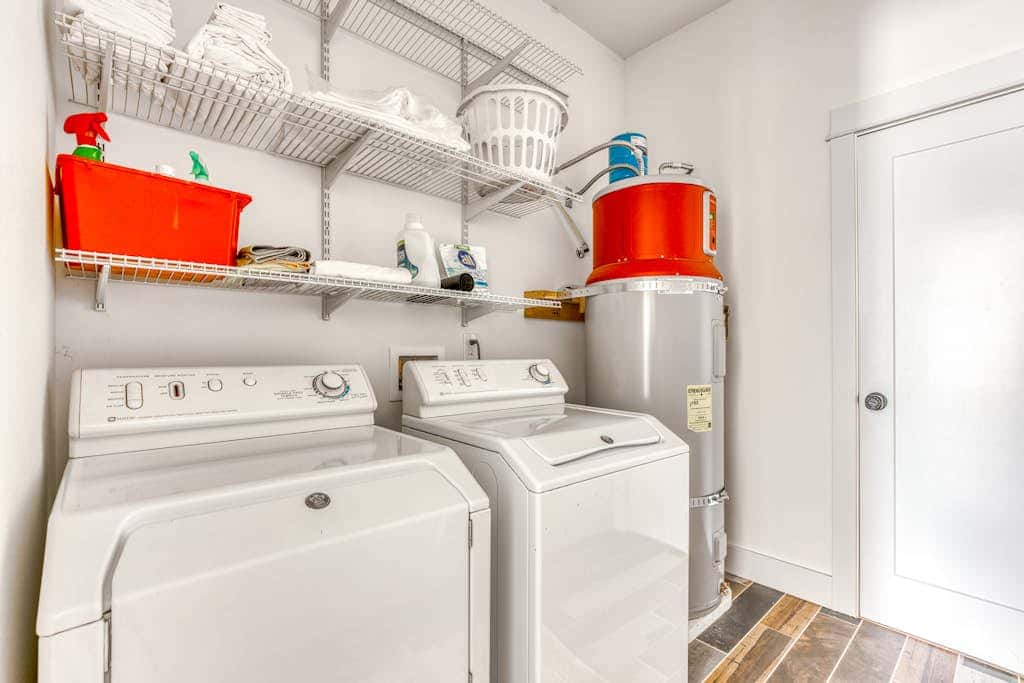 Dog-friendly studio with river view, patio, grill, & shared W&D