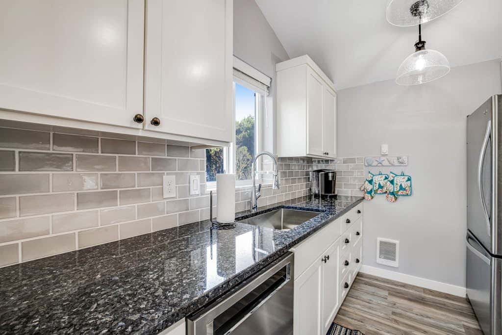 Oceanfront home with hot tub, private beach access & ocean views - dog-friendly