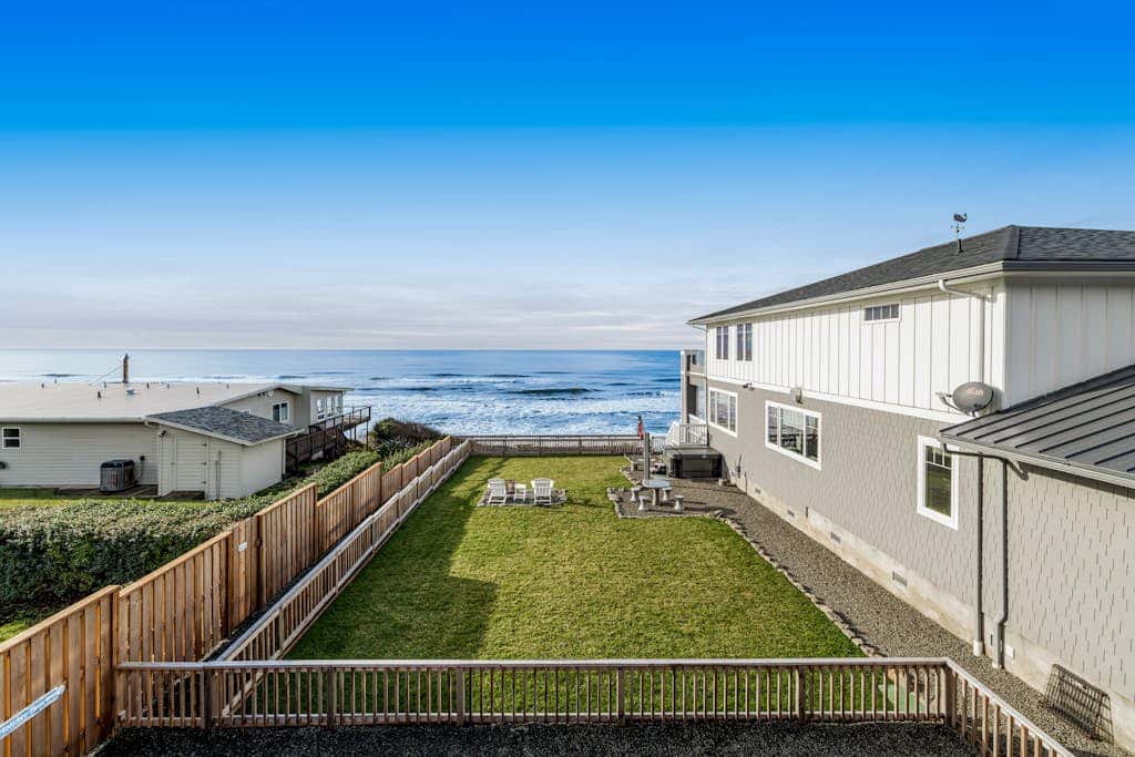 Oceanfront home with hot tub, private beach access & ocean views - dog-friendly