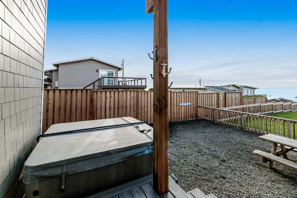 Oceanfront home with hot tub, private beach access & ocean views - dog-friendly