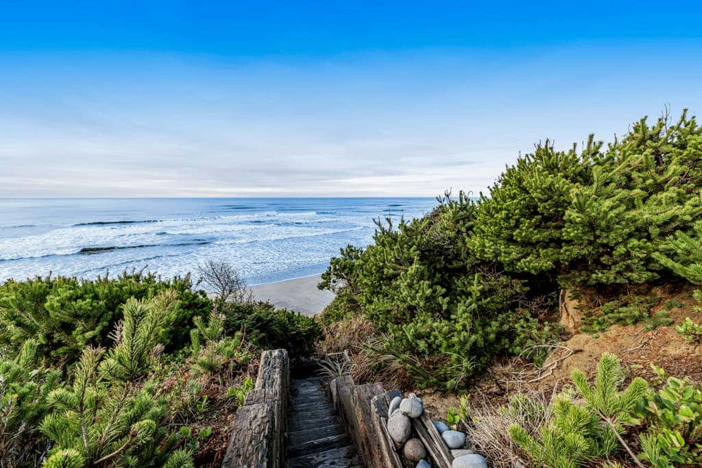 Oceanfront home with hot tub, private beach access & ocean views - dog-friendly