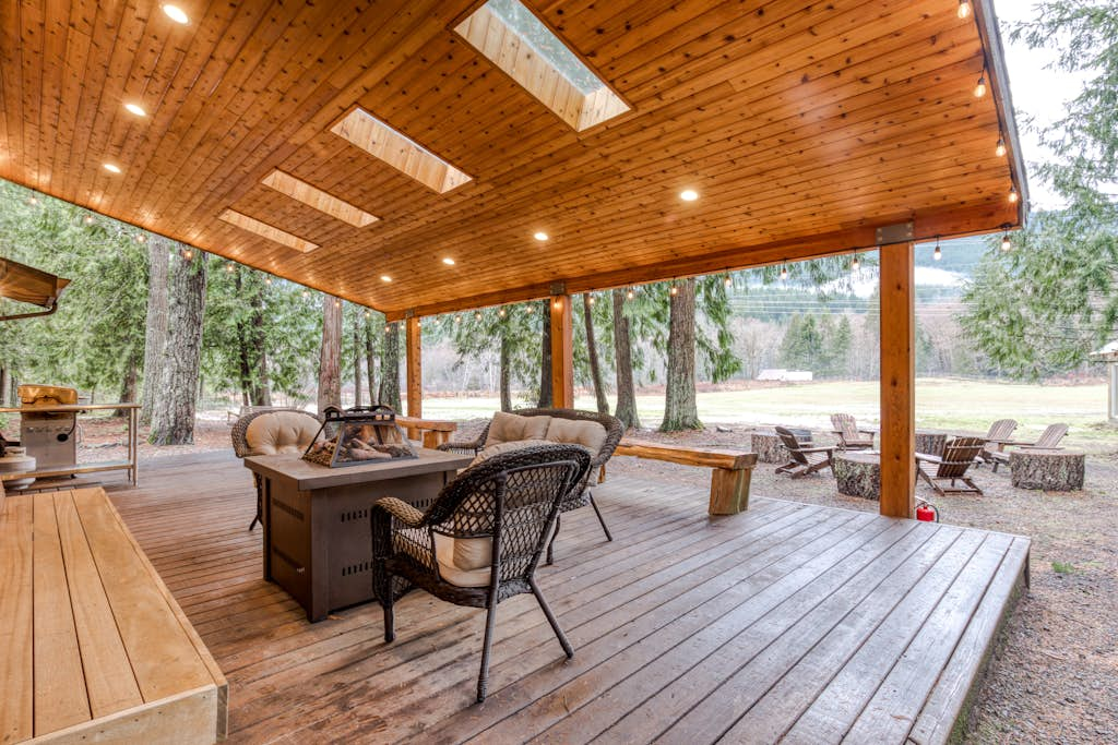 Modern, spacious getaway with private hot tub, wood fireplace, WiFi, & game room