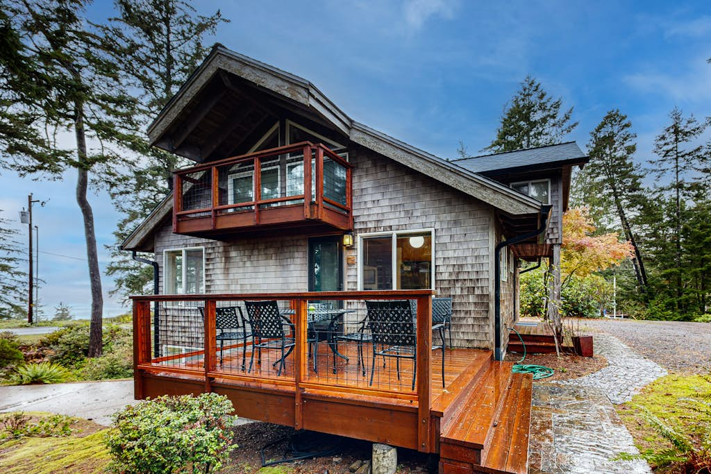 Spacious 3-story home near the beach with water views, grill, deck, & firepit